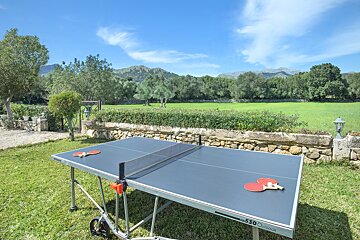 A ping pong table that says 530 outdoor on it