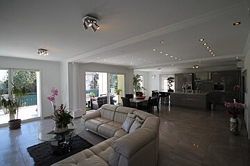 A living room with a couch and a table