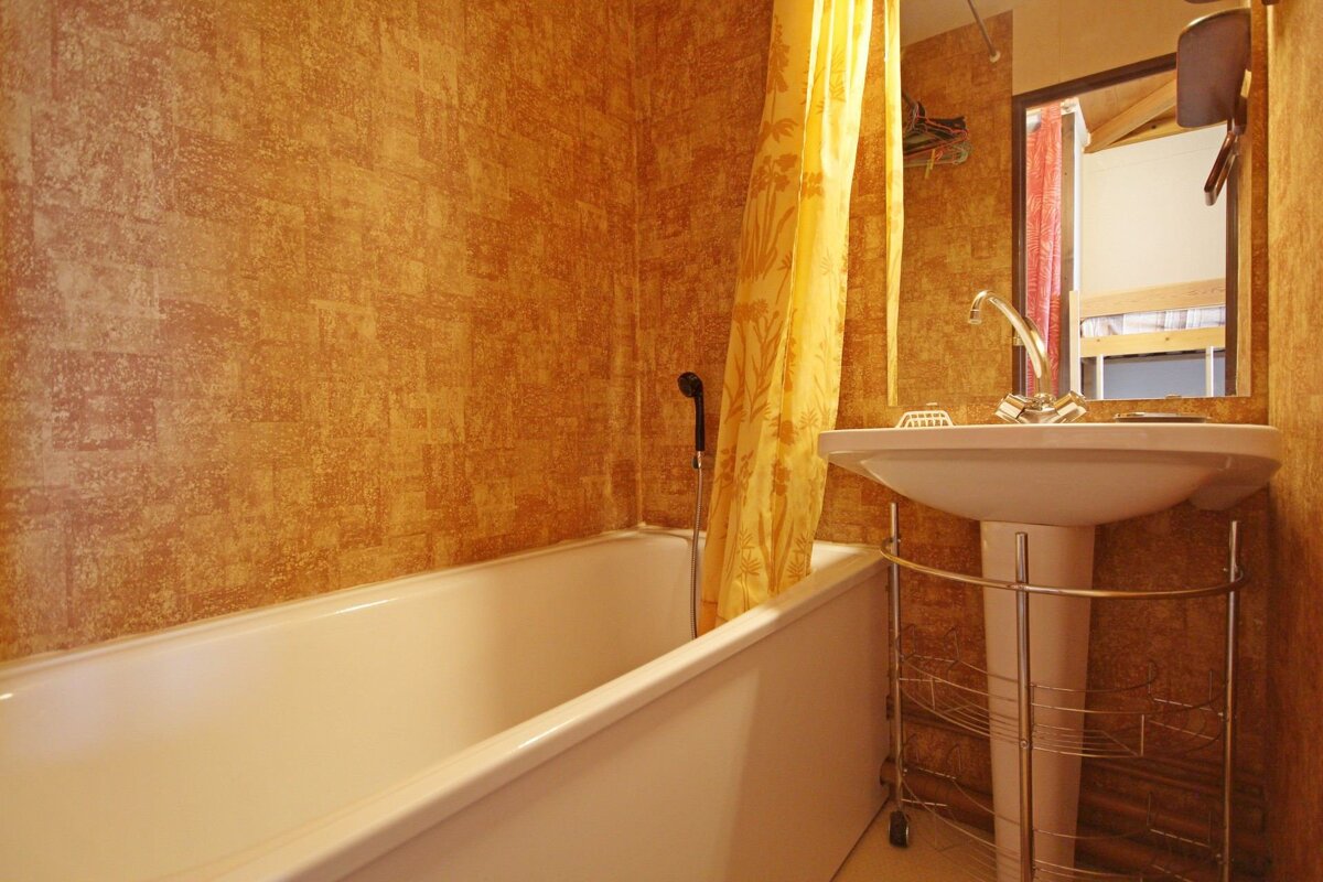 A bathroom with a sink and a bathtub