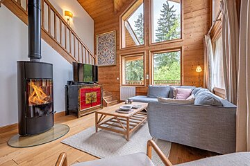 A living room with a fireplace and a couch