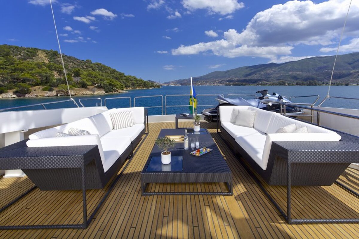 A boat with a jet ski on the back of it