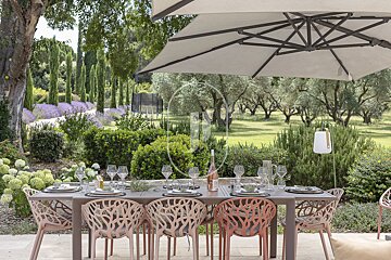 A table with a bottle of rosé wine on it