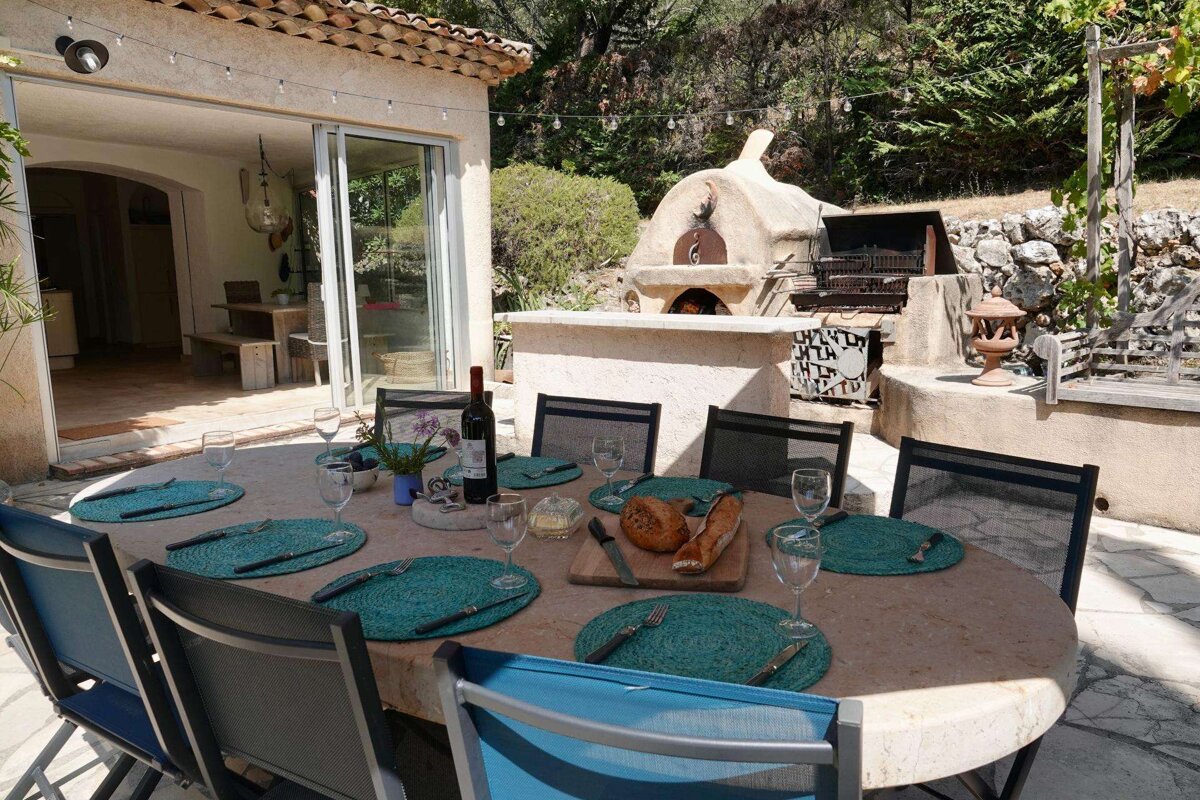 A table with a bottle of wine on it