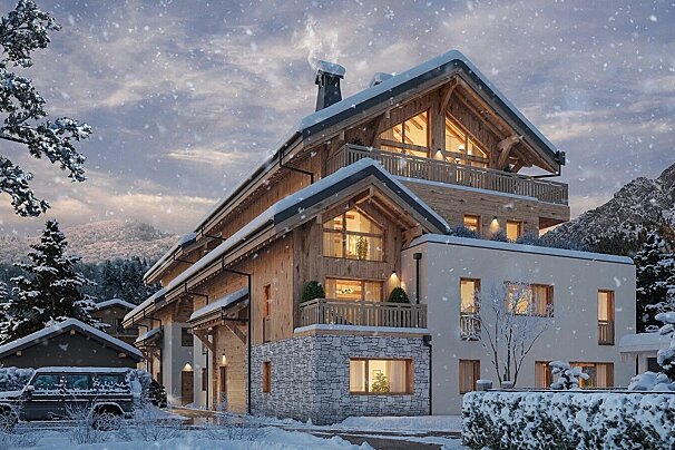A beautiful, large chalet with wood and stone accents in a snowy mountain landscape, illuminated by warm interior lights and falling snow.