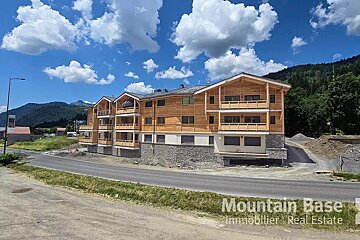 A building that is being built by mountain base