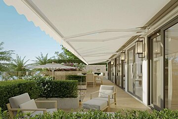 A balcony with a white awning over it