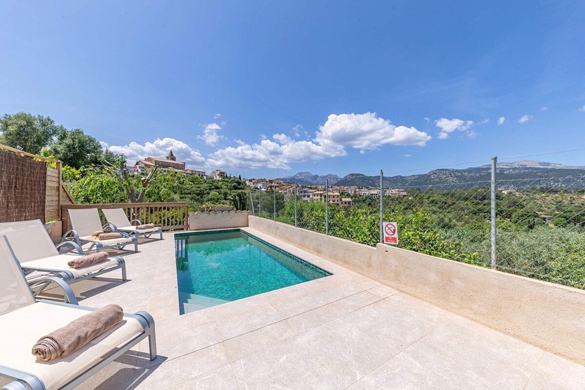 A swimming pool with a no swimming sign on the side