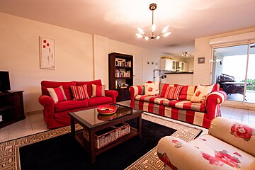 A living room with two couches and a coffee table