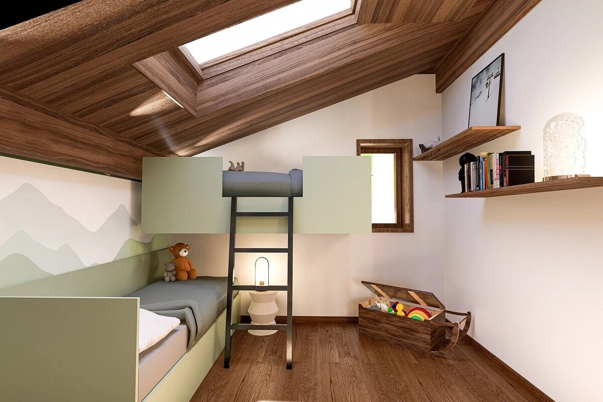 Cozy attic kids' room with a wooden ceiling and skylight, green bunk beds, and a mountain mural. Features wood floors, shelves, and a toy chest.