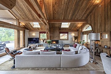 A living room filled with furniture and a fireplace