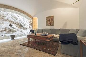 A living room with a couch and a coffee table