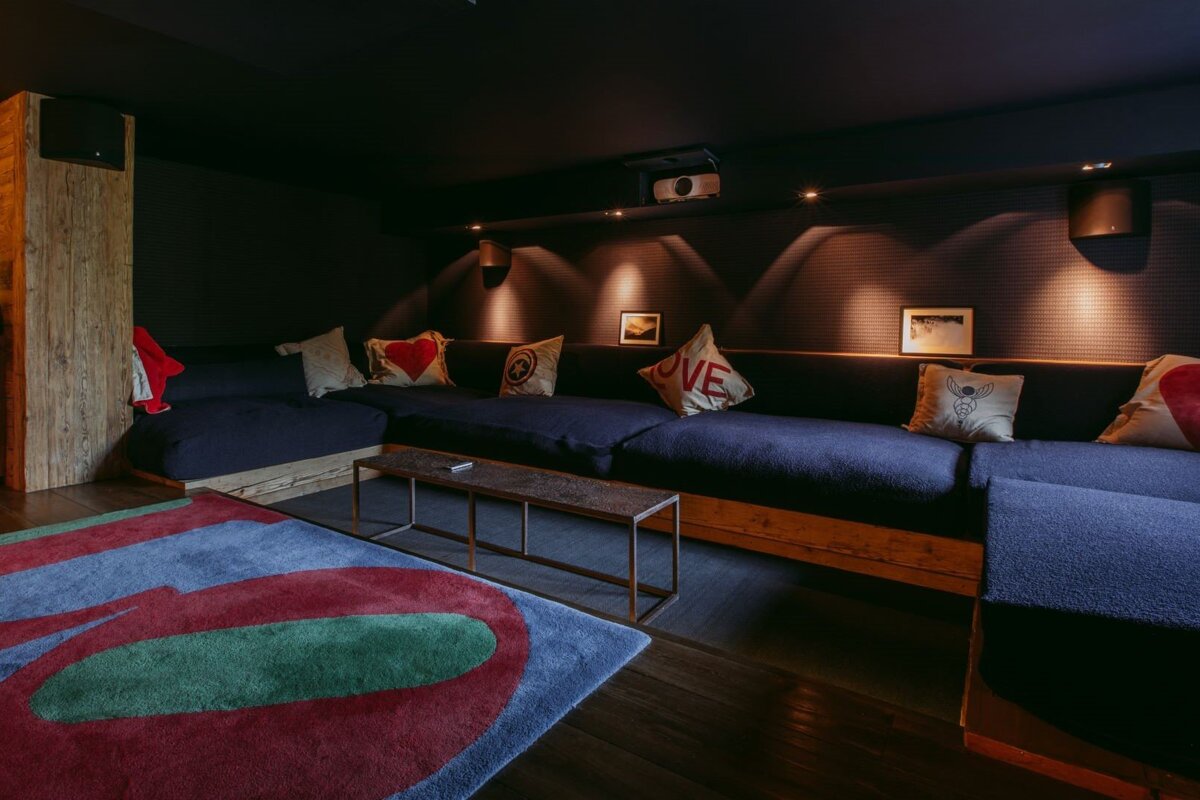 A couch with a pillow that says love on it
