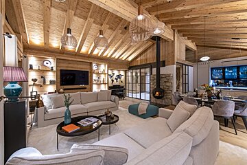 A living room with a couch and a television