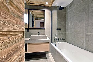 A bathroom with a sink and a bathtub