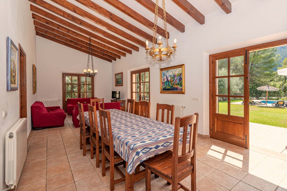 A dining room table with a blue and white table cloth