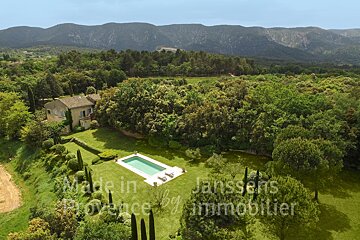 An aerial view of a house in provence by janssens immobilier