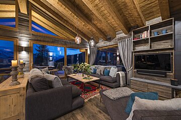 A living room filled with furniture and a flat screen tv
