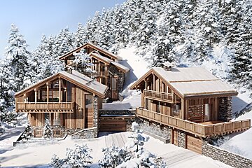 A group of snow covered houses in the mountains