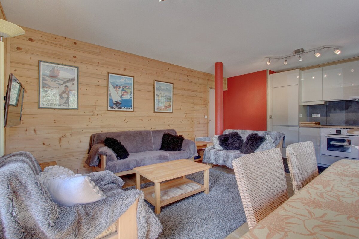 A living room with a couch and a coffee table