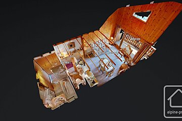 A 3D isometric floor plan of a rustic chalet interior, showcasing wood-paneled walls and exposed beams. Labeled sections include entrance, living/kitchen, balcony, WC, and SDB.