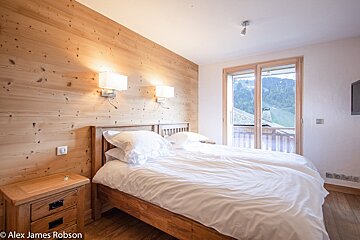 A photo of a bedroom by alex james robson