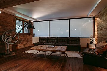 A living room with a couch and a coffee table