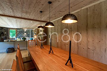 A picture of a dining room with the number 80 on the wall