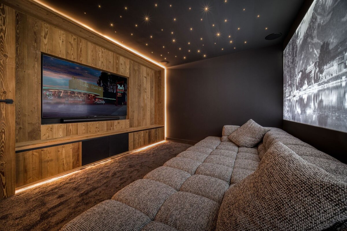 A living room with a couch and a flat screen tv