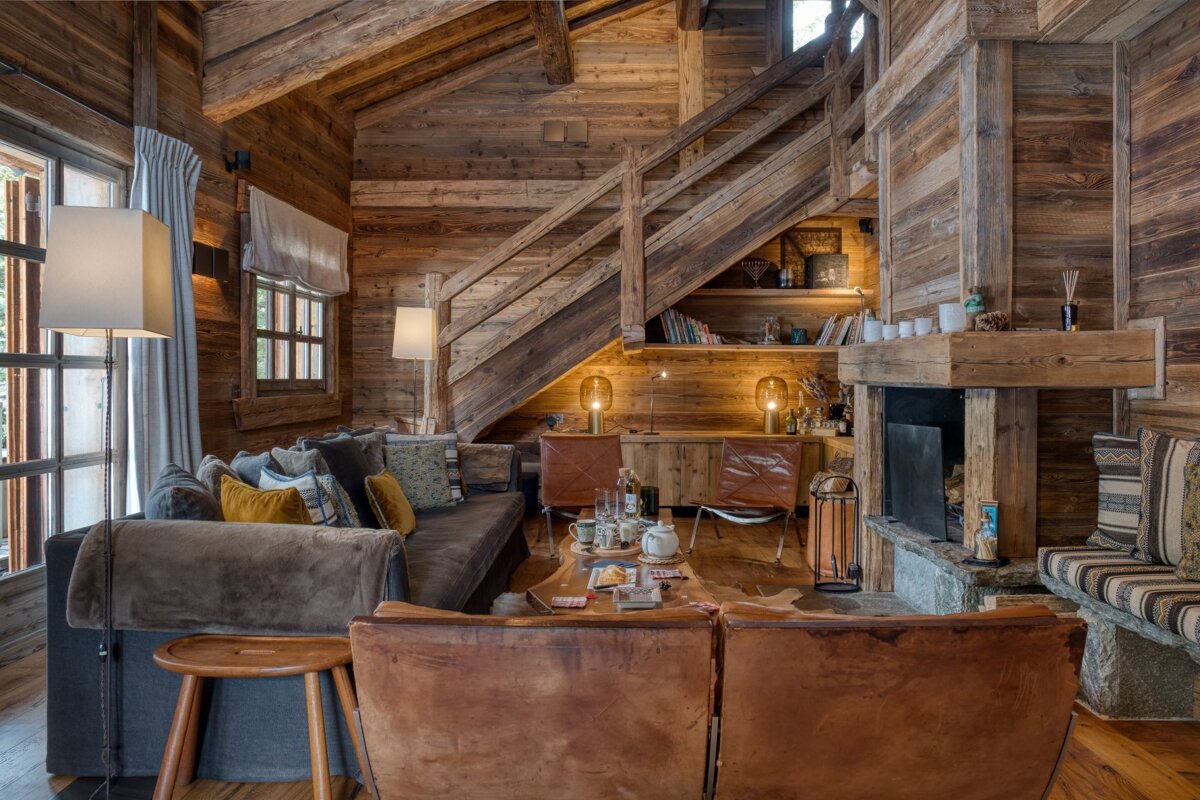 A living room filled with furniture and a fireplace