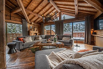 A living room with a couch and a coffee table