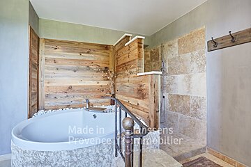 A bathroom with a bathtub made in provence