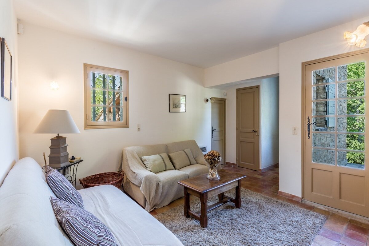 A living room with a couch and a coffee table