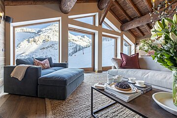 A living room with a couch and a coffee table