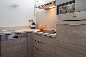 A kitchen with a stainless steel appliance that says airlive