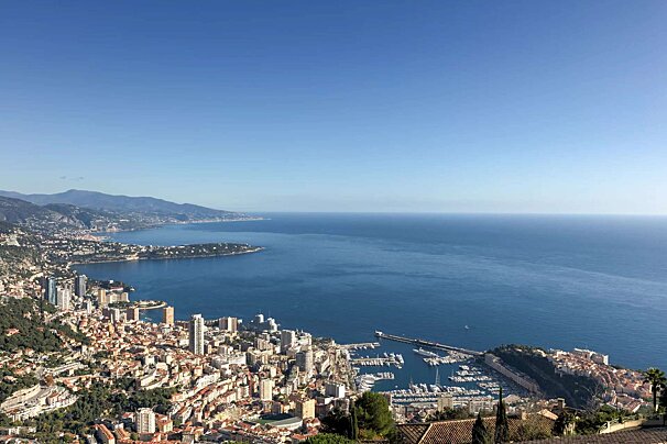 A large body of water with a city in the foreground
