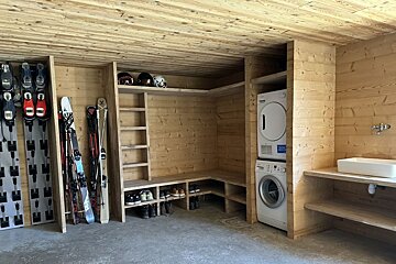 A washer and dryer are stacked on top of each other