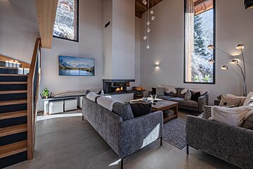A living room with two couches and a coffee table