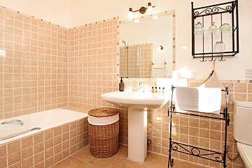 A bathroom with a sink and a bathtub