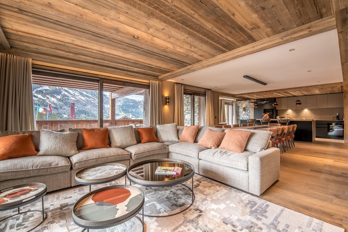 A living room with a couch and two coffee tables