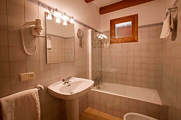 A bathroom with a sink and a bathtub