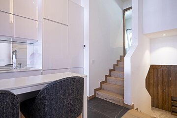 A staircase leading up to the second floor of a house