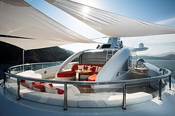 A yacht with a couch and a table on the deck