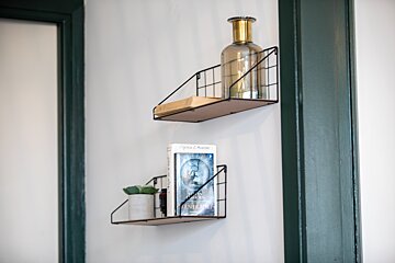 A book on a shelf that says ' james bond ' on it