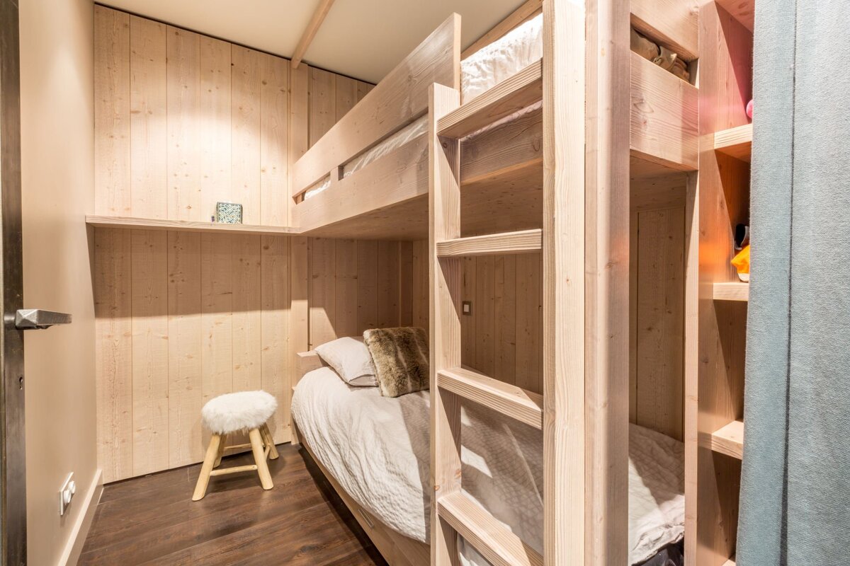 A large building with a mountain in the background