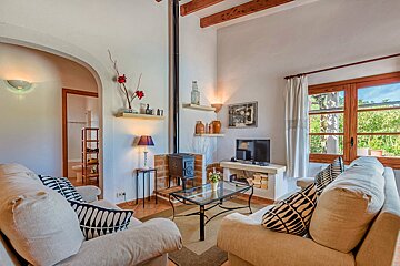 A living room with a fireplace and a couch
