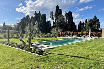 A large swimming pool with the words made in provence on the bottom