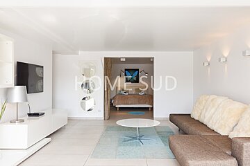 The word home that is on a white wall