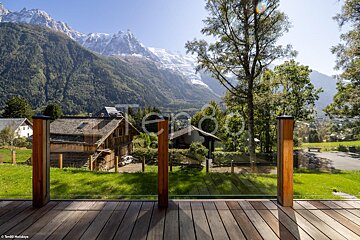 A view of the mountains from a deck with the word holidays in the corner