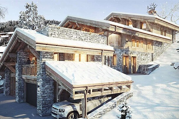 A car is parked in front of a snowy house