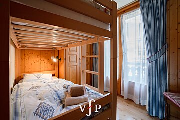 A bunk bed with the letter vfp on it